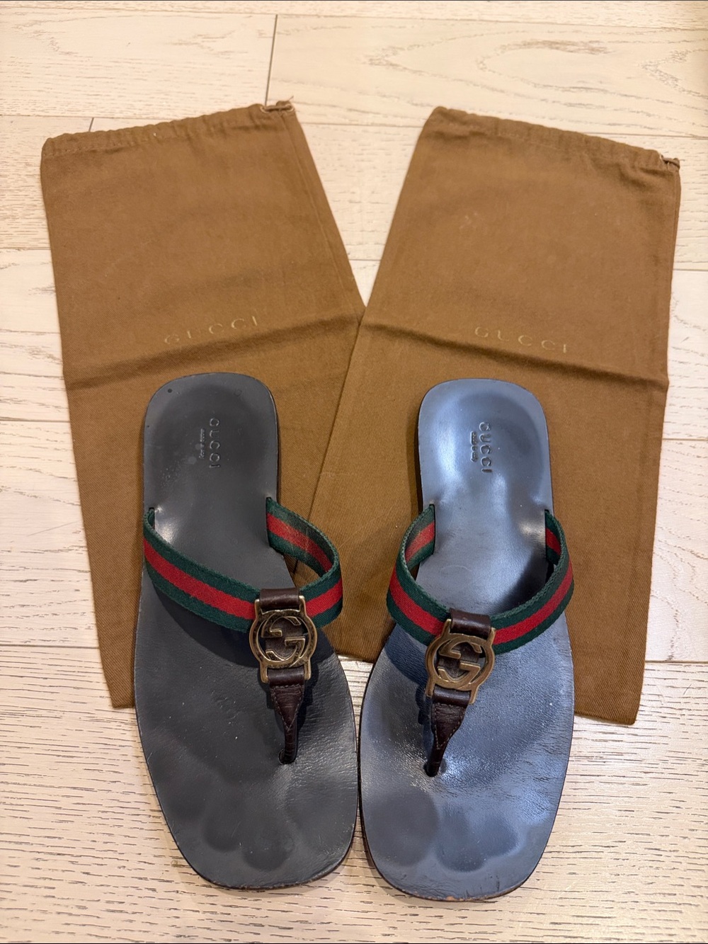 Gucci Women's Black Leather Flip Flop Sandals with Iconic Green-Red Webbing